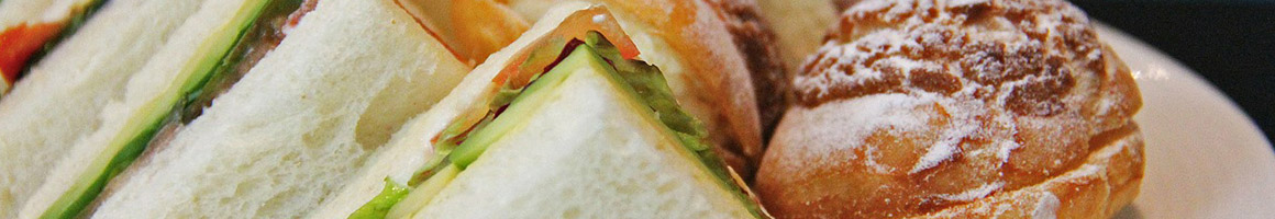 Eating Sandwich at Manhattan Bagel restaurant in Elmwood Park, NJ.